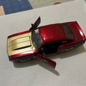 Red and Gold Toy Car